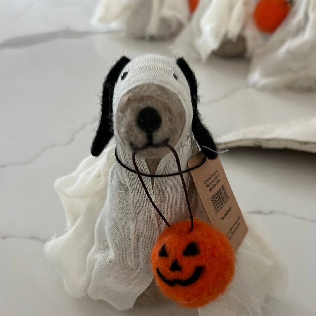 Dog with ghost costume